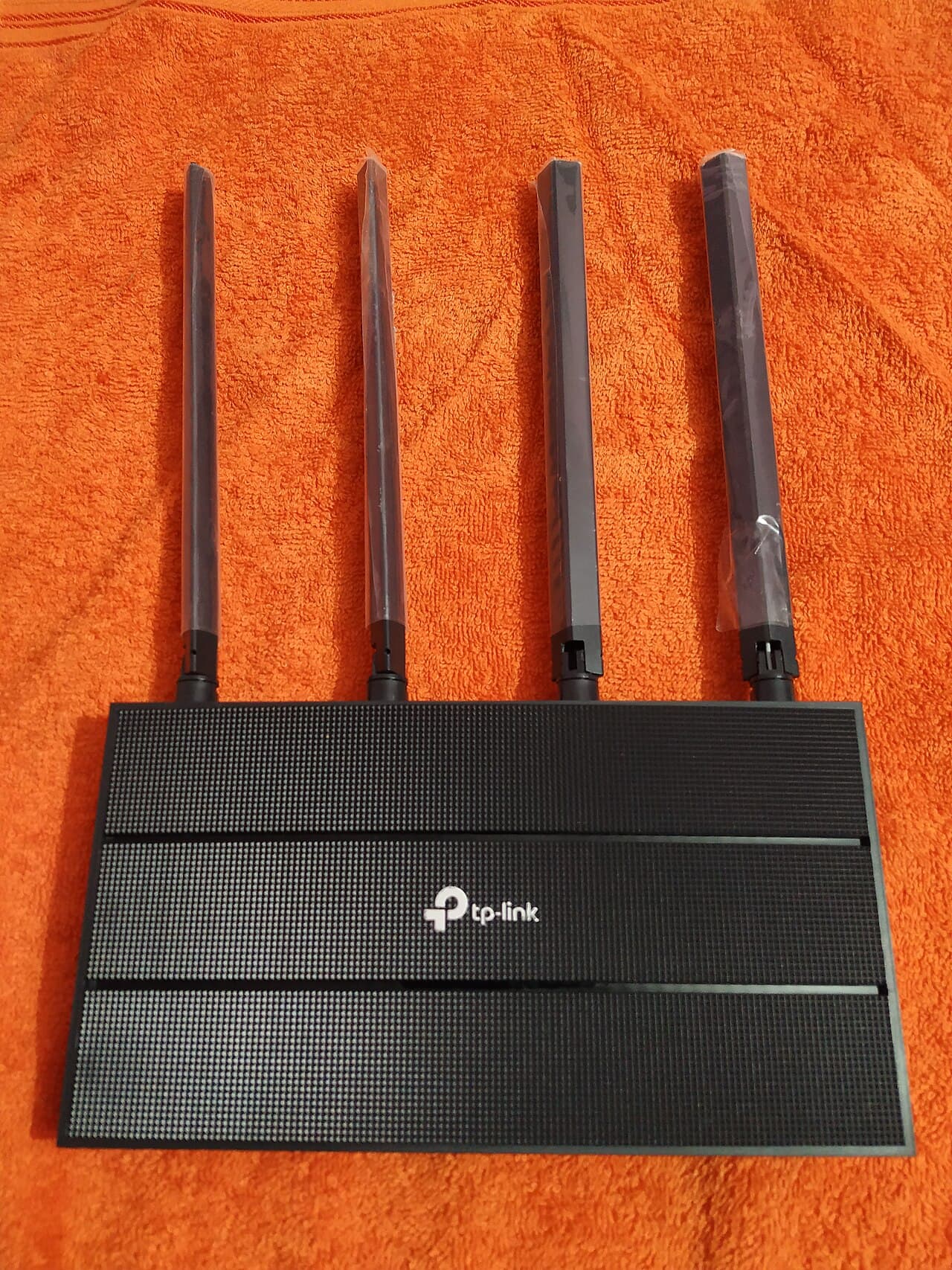A TP-Link AC1200 mesh Wi-Fi router unit