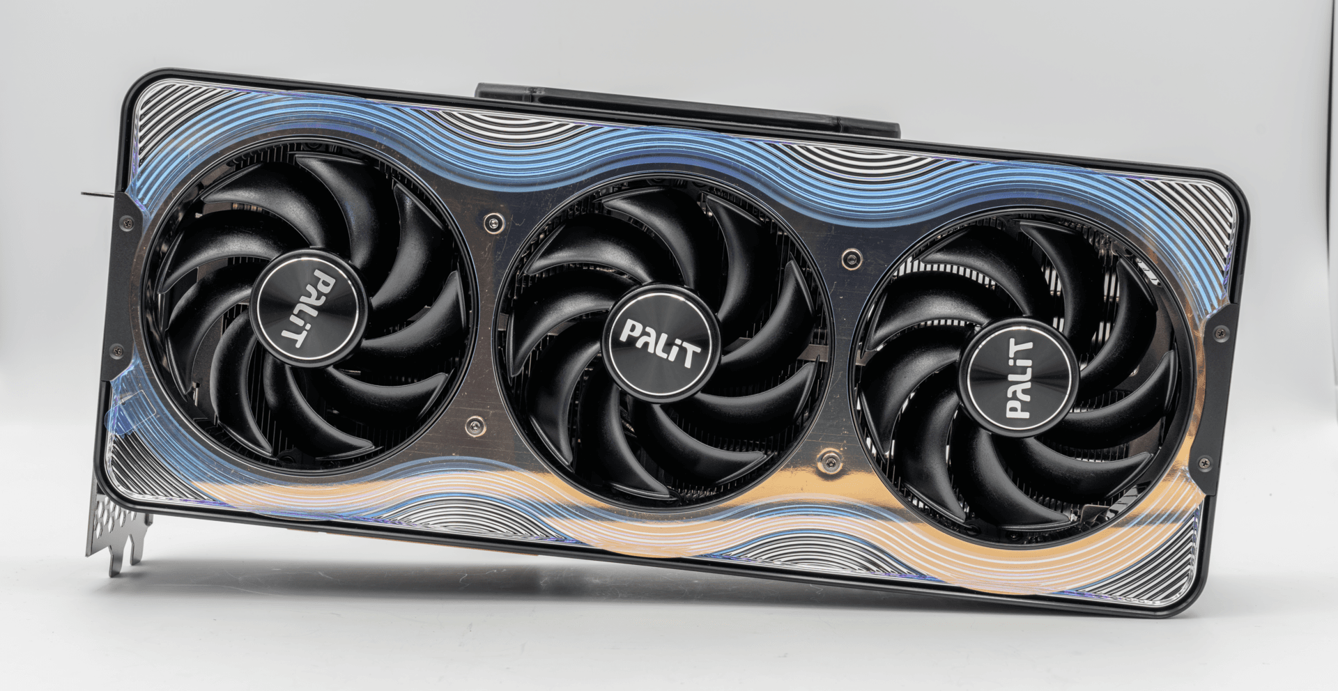 Palit GeForce RTX 5090 GameRock graphics card photographed face-on against a white background, showing its three fans