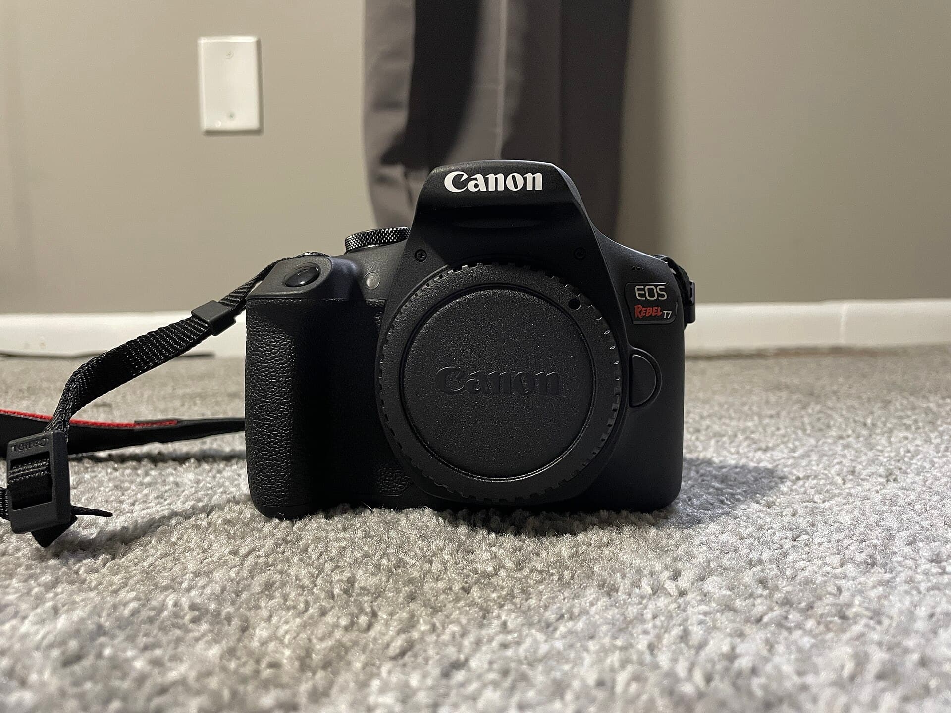Canon EOS Rebel T7 (EOS 2000D) entry-level DSLR camera, front view